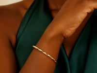 14k Yellow Gold Thin Twisted Shiny Bangle (2.50 mm)